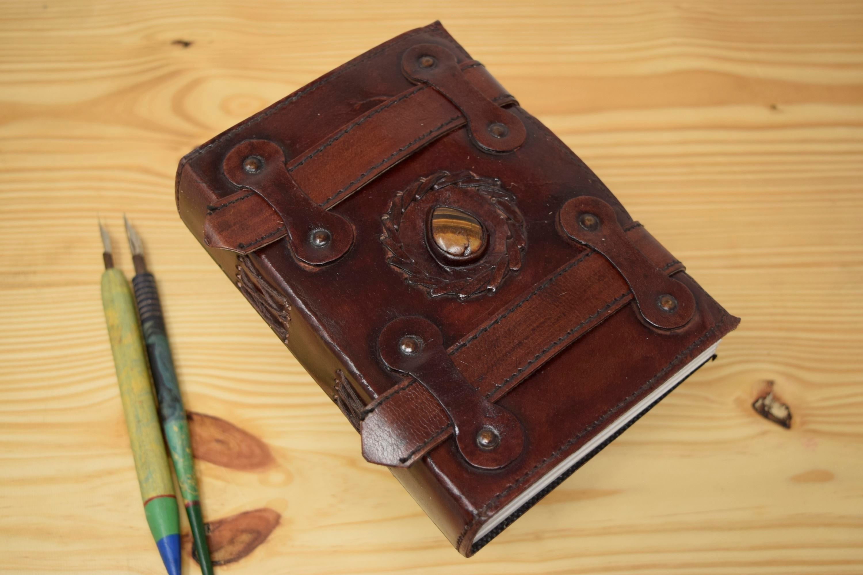 The Art of Journaling: Handcrafted Leather Journals - double strap centre stone